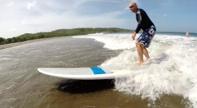 man surfing Nicaragua – Best Places In The World To Retire – International Living